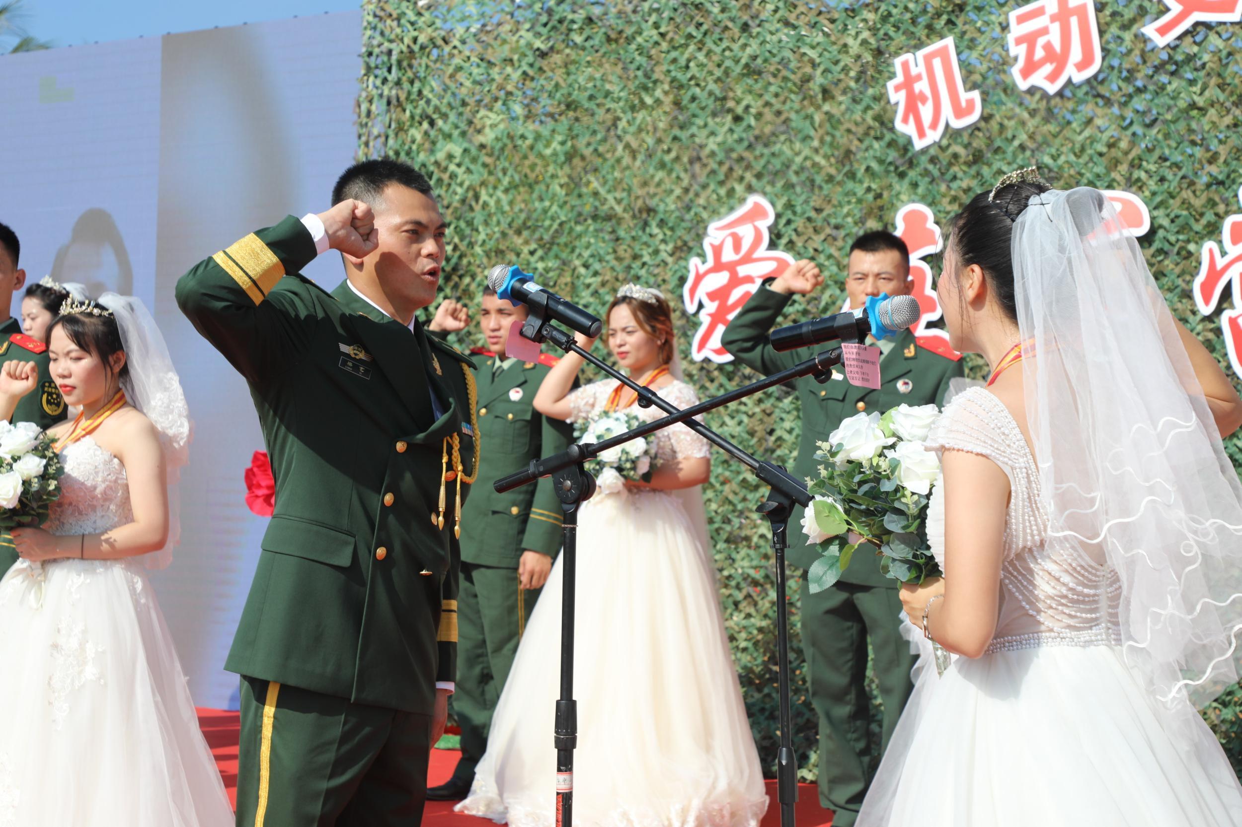 当“橄榄绿”遇上“婚纱白” 武警海南总队机动支队14对新人步入婚姻殿堂
