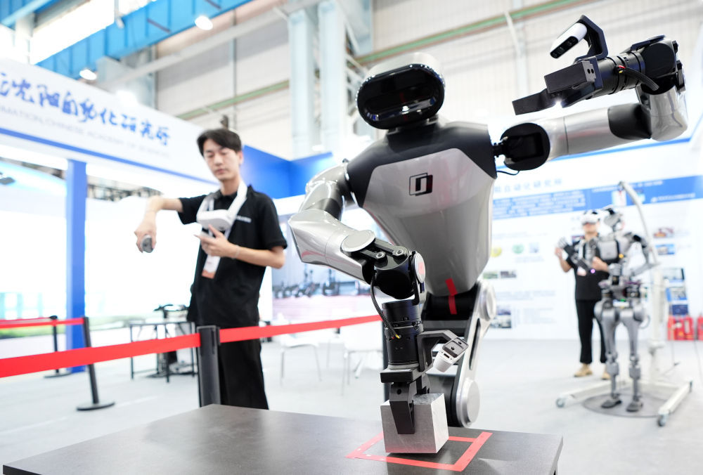 九游娱乐网站：新华社丨AI+工业互联网探访进化中的沈阳制造业企业(图1)